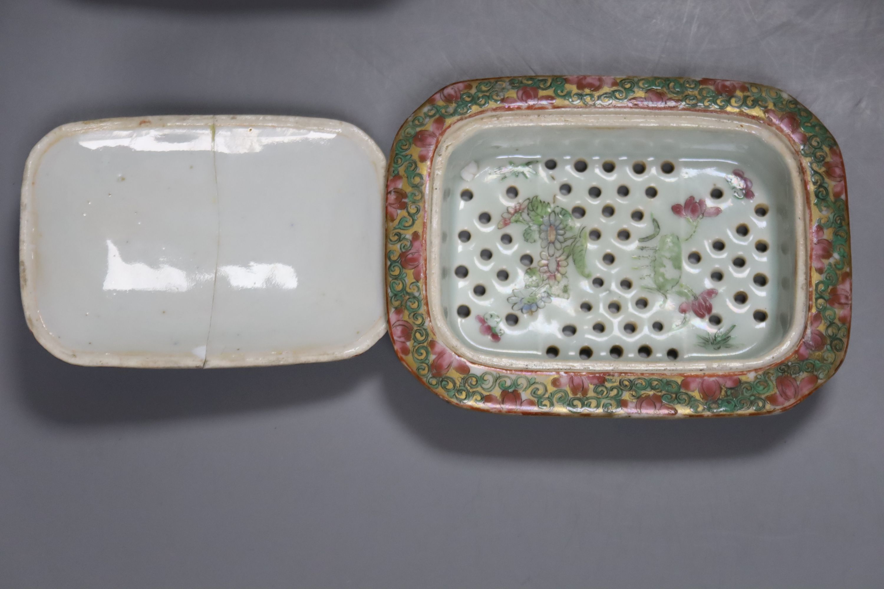 A Chinese famille rose soap dish strainer and cover, a two handled cup and a box and cover, 19th century, tallest 10cm